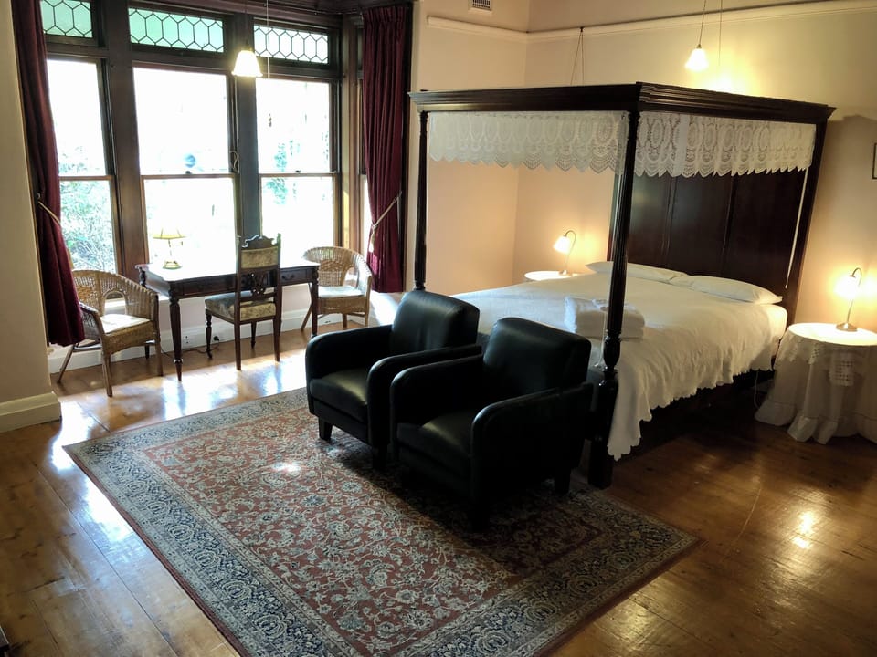Deluxe Double Room, Garden View | Desk, laptop workspace, blackout drapes, iron/ironing board