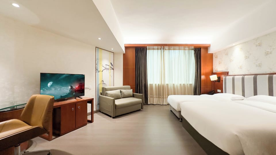 Premium bedding, down comforters, memory foam beds, free minibar