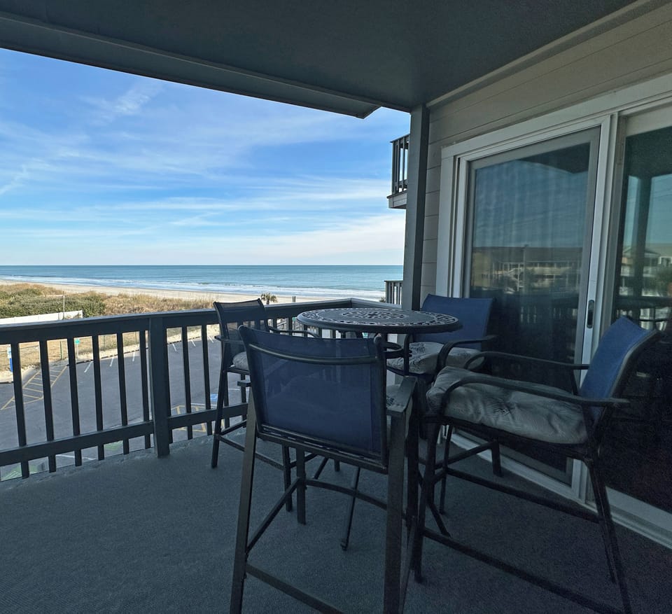 Enjoy seating for 4 on the balcony facing the ocean