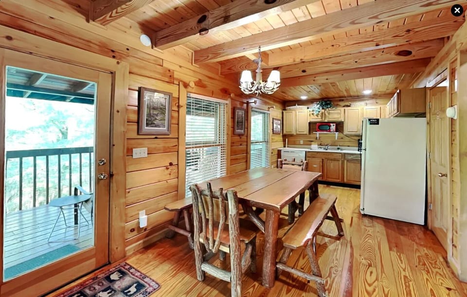 Beautiful log dining table and fully equipped kitchen