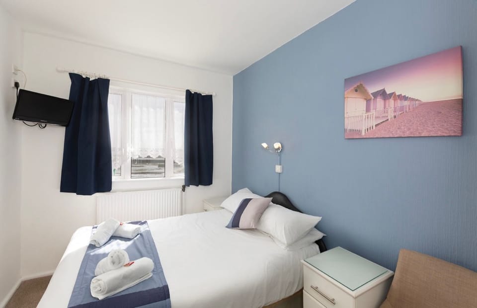 Desk, blackout drapes, iron/ironing board (on request), WiFi (free)