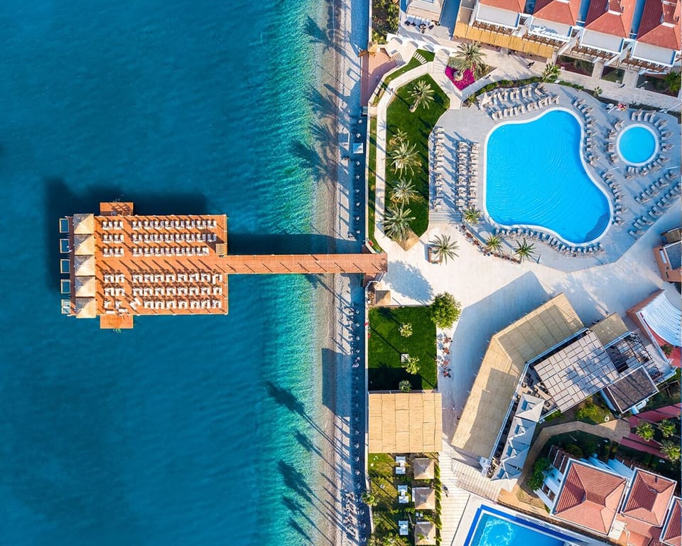 2 outdoor pools, pool umbrellas, sun loungers