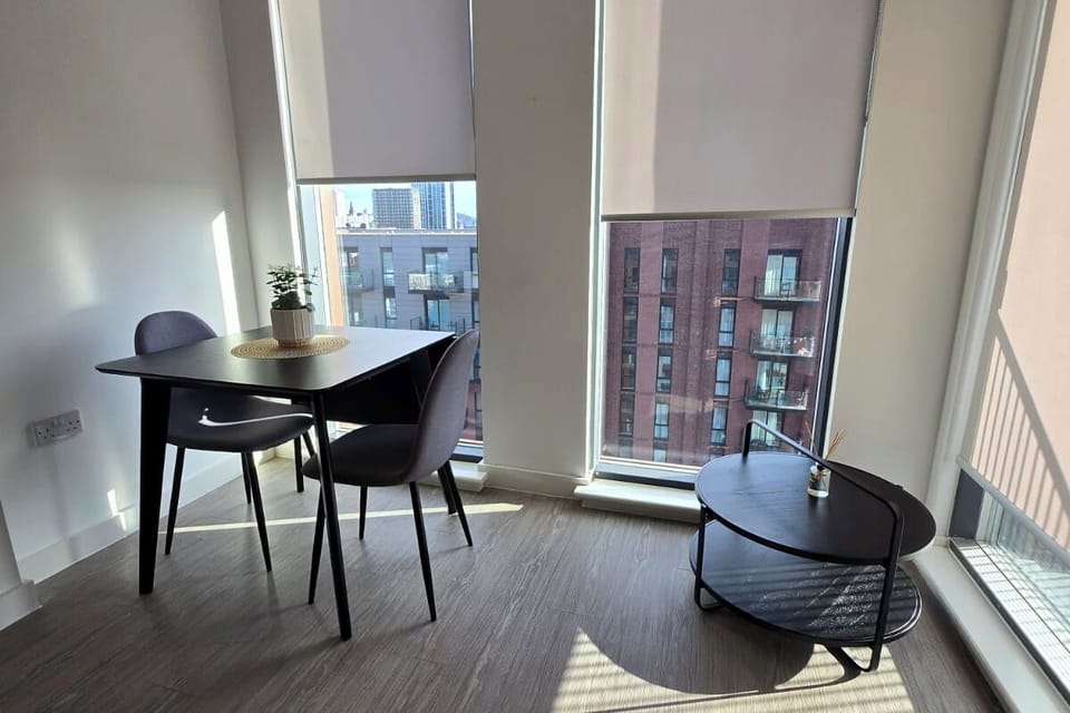 Open space dining area with a view from the height of the building 