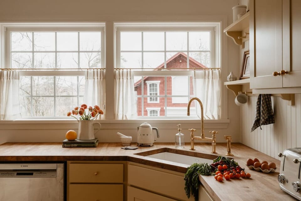 Bright and airy kitchen with scenic views of the outdoors.