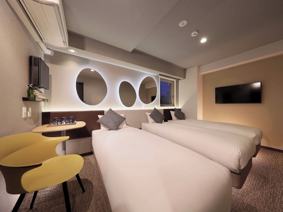 Triple Room Size: 17㎡ Bedding: 3 single beds Capacity: 1-3 people