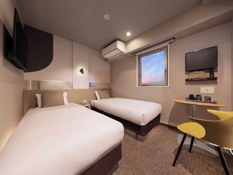 Twin room Size: 15-22㎡ Bedding: 2 single beds Capacity: 1-2 people