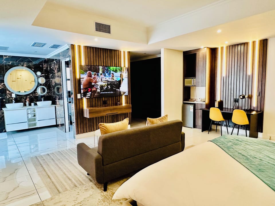 Exclusive Suite, Garden View | Desk, laptop workspace, iron/ironing board, free WiFi