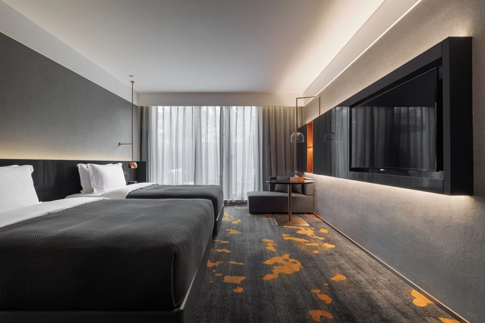 Family Room | In-room safe, blackout drapes, iron/ironing board (on request)