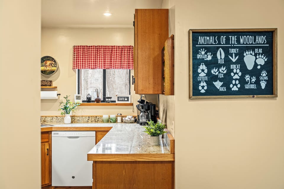 Bright kitchen with a view and all the essentials for home-cooked meals.