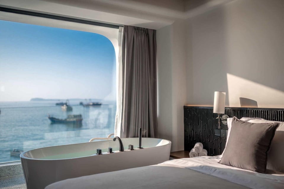 Luxury Twin Room, Sea View | Premium bedding, down comforters, free minibar, blackout drapes