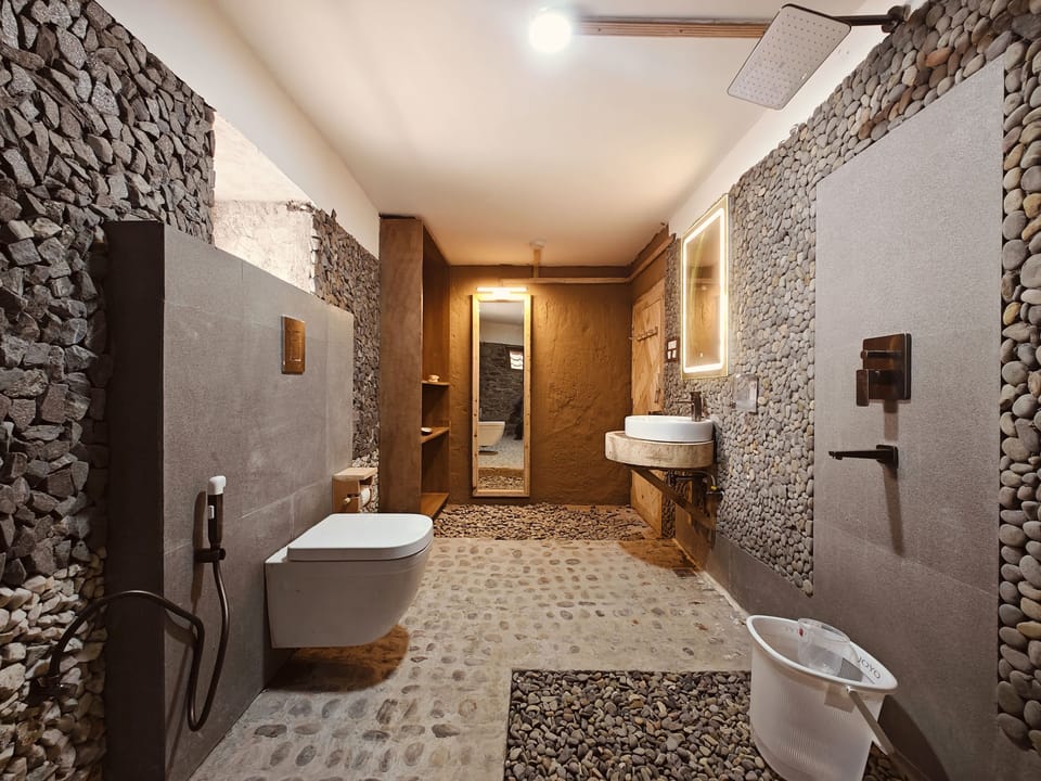 Shower, hair dryer, slippers, towels