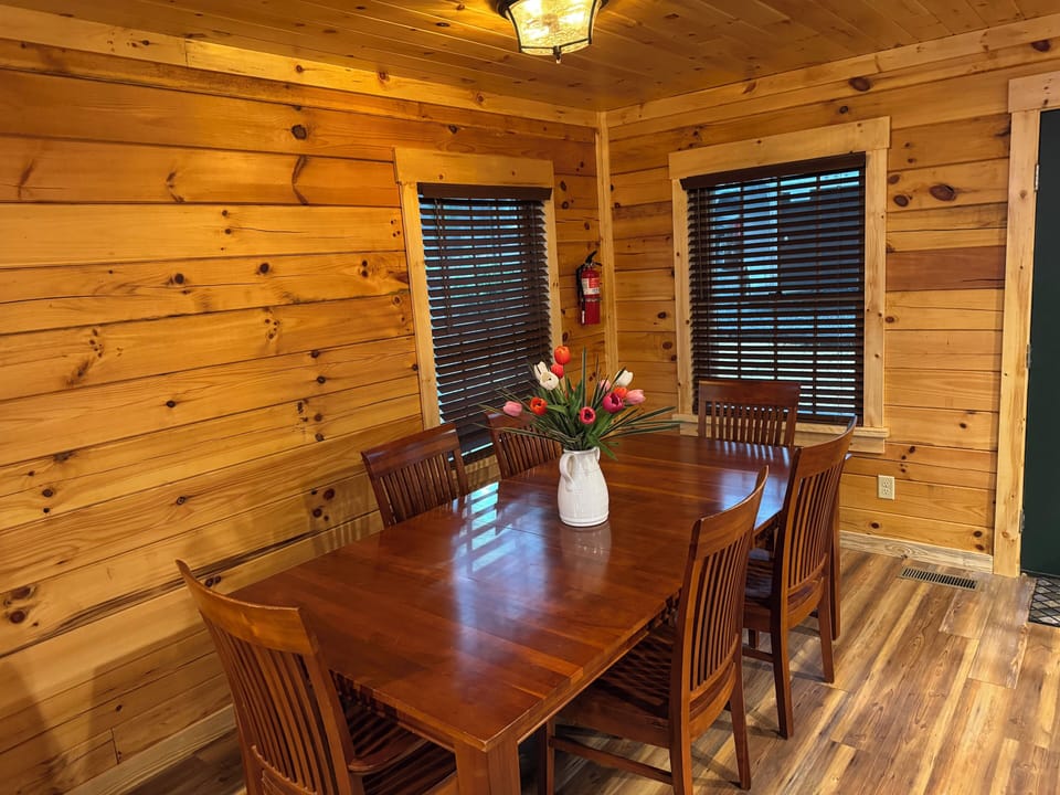 Huge dining table with room for eight. What is for dinner? Fresh caught fish? Steaks from our non GMO farm? 