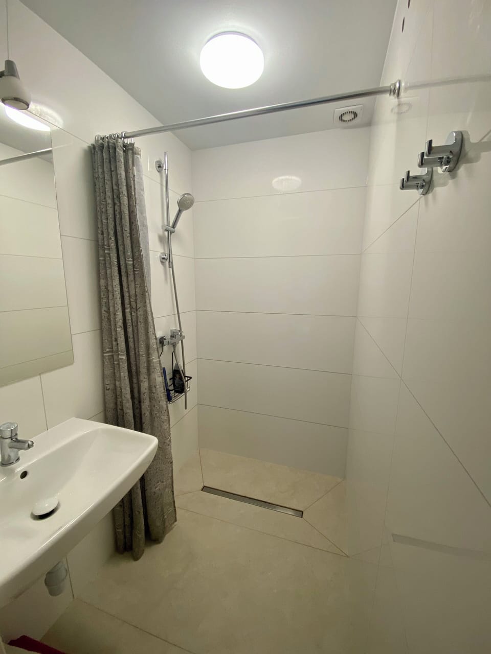 Shower, towels, soap, toilet paper