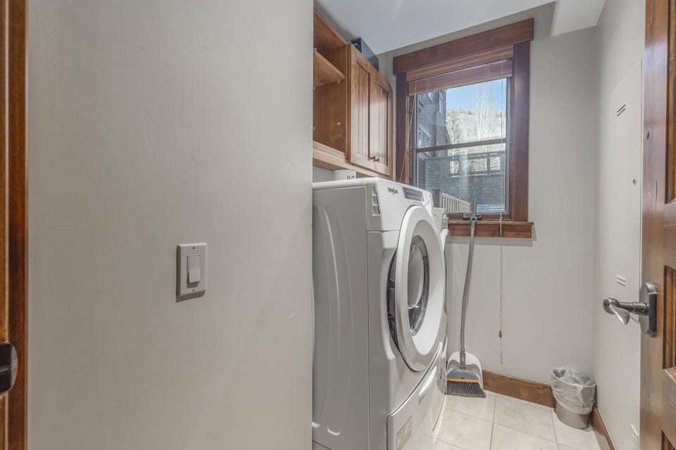 Laundry room with a full-size washer and dryer