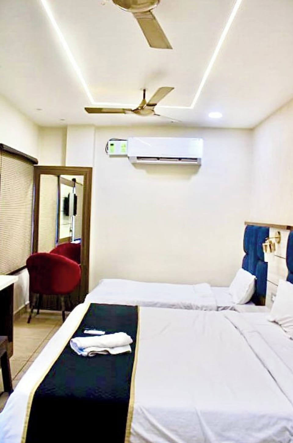 Deluxe Triple Room, Balcony, City View | Desk, laptop workspace, blackout drapes, soundproofing