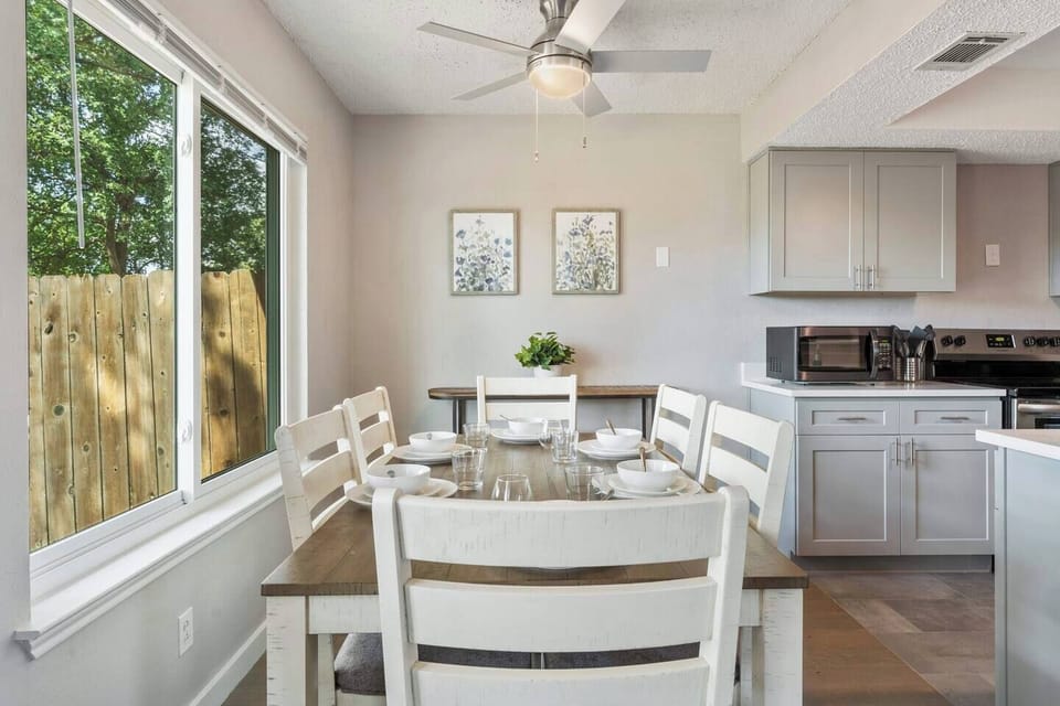 Dining area seats 6 and has easy access to kitchen and living area