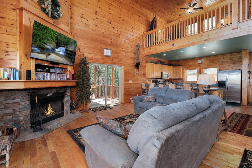 Gather together to watch some TV or play family games in the Living area of this spacious cabin rental