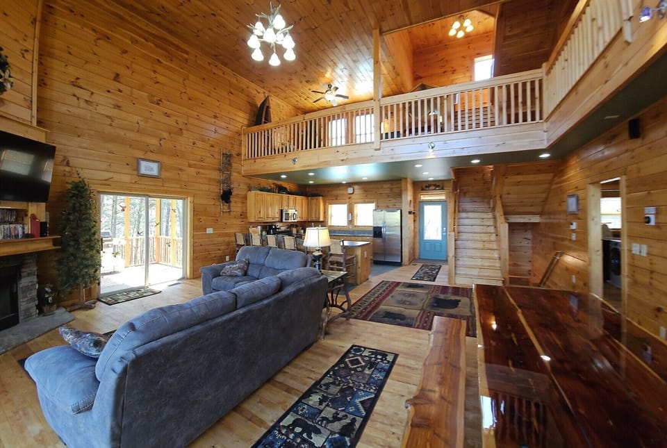Spacious living area with wood burning fireplace