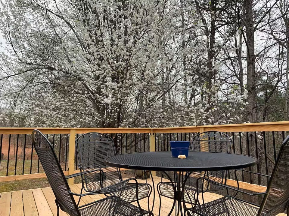 Sip coffee on your deck, surrounded by blooming trees and serene nature views!