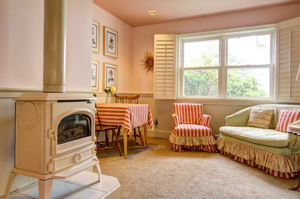 Honeymoon Cottage, 1 Bedroom, Jetted Tub, Garden View | In-room safe, blackout drapes, soundproofing, iron/ironing board