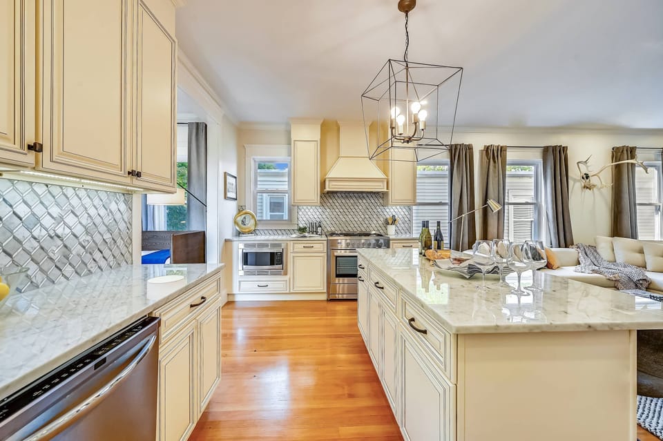 Open Concept Chef's Kitchen | Fully Stocked | Open to Dining | Second or Third Floor
