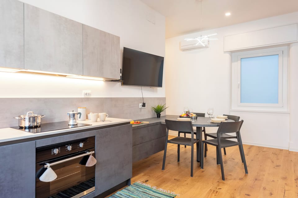 Family Apartment, Multiple Bedrooms (Central Apartment Piazza Dante Genova) | Private kitchen | Fridge, oven, stovetop, dishwasher