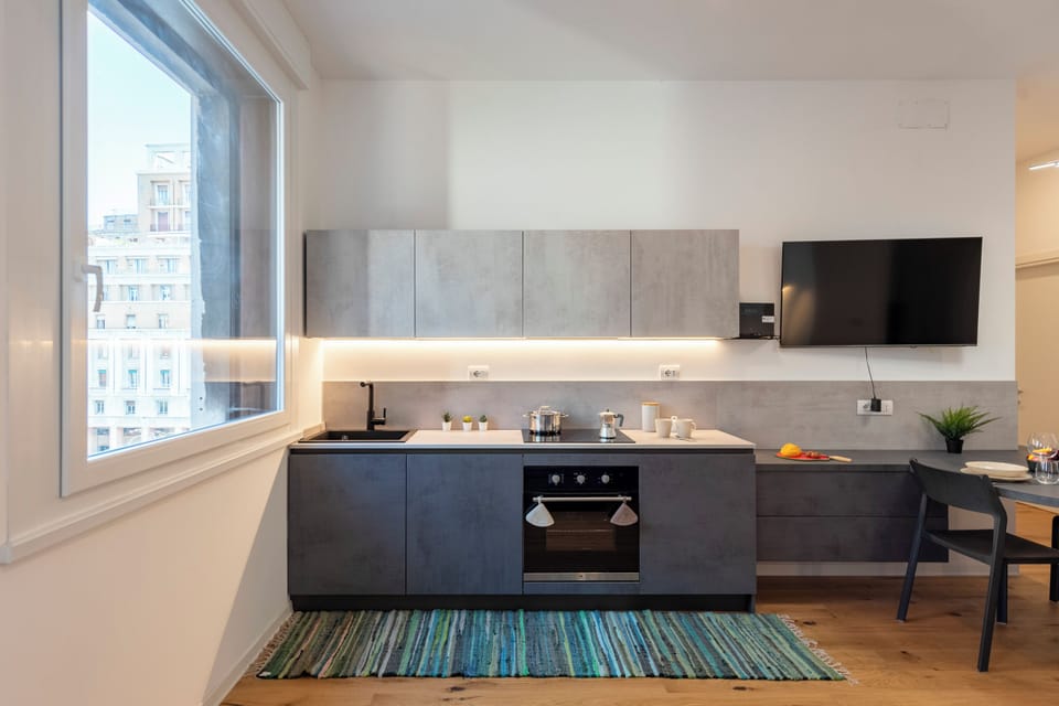 Family Apartment, Multiple Bedrooms (Central Apartment Piazza Dante Genova) | Private kitchen | Fridge, oven, stovetop, dishwasher