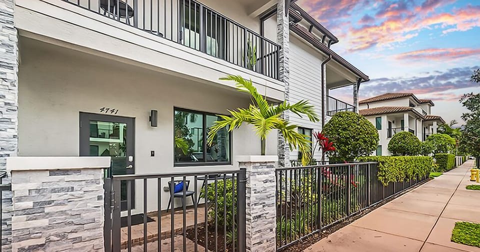 A modern exterior with clean architectural lines, expansive windows