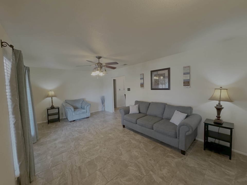 Curl up in the serene living room & enjoy a great book