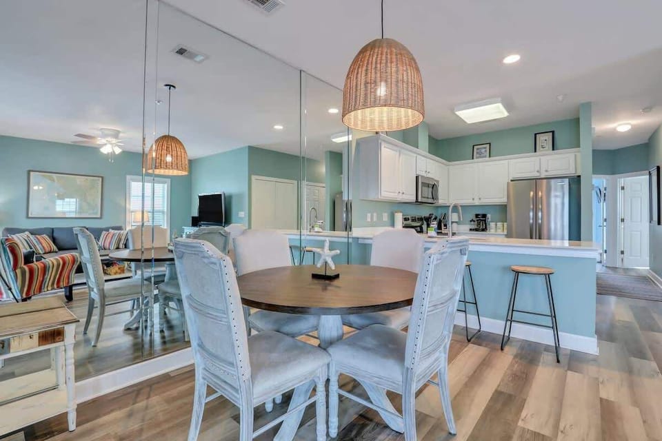 Fresh and Inviting - Coastal-inspired dining room, perfect for casual meals or special occasions. 