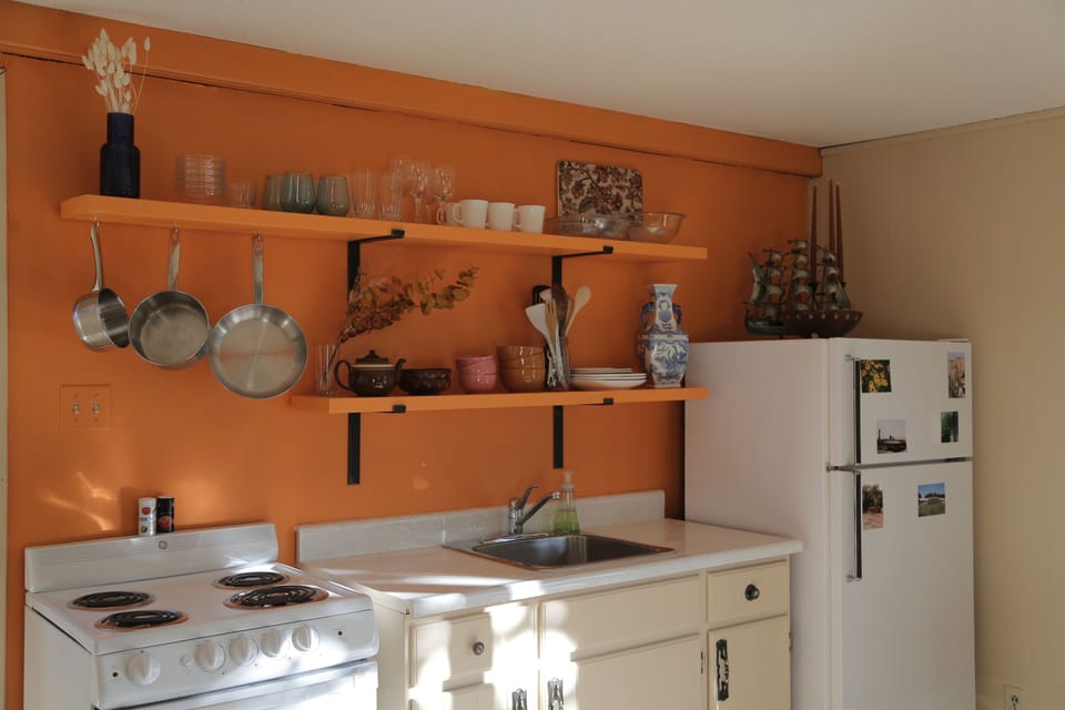 Standard Cabin, 1 Queen Bed | Private kitchen | Dining tables