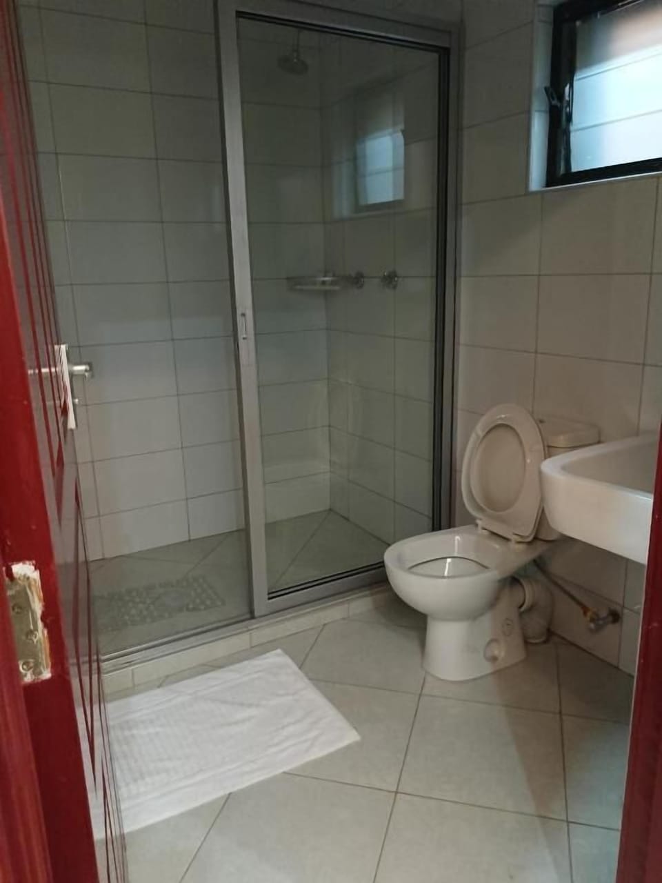 Shower, free toiletries, slippers, towels