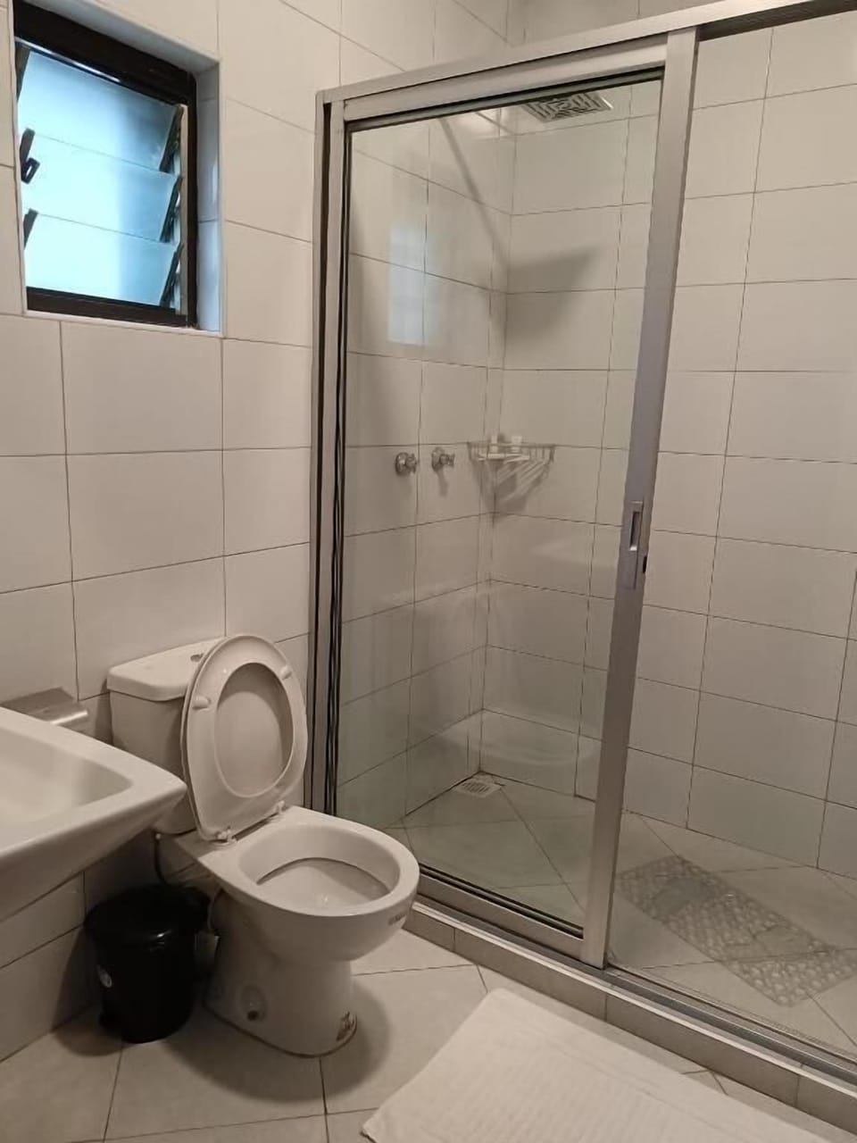Shower, free toiletries, slippers, towels