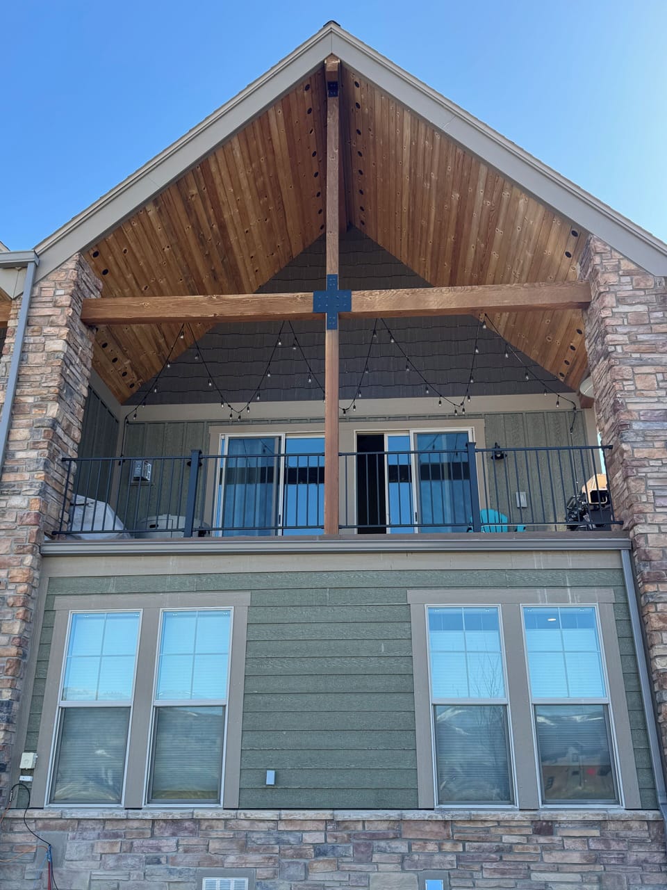 Exterior back of house with balcony overlooking the golf course