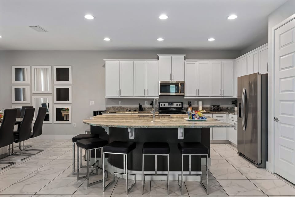 Huge counter space perfect for breakfast before the parks. Family-friendly layout with plenty of seating.