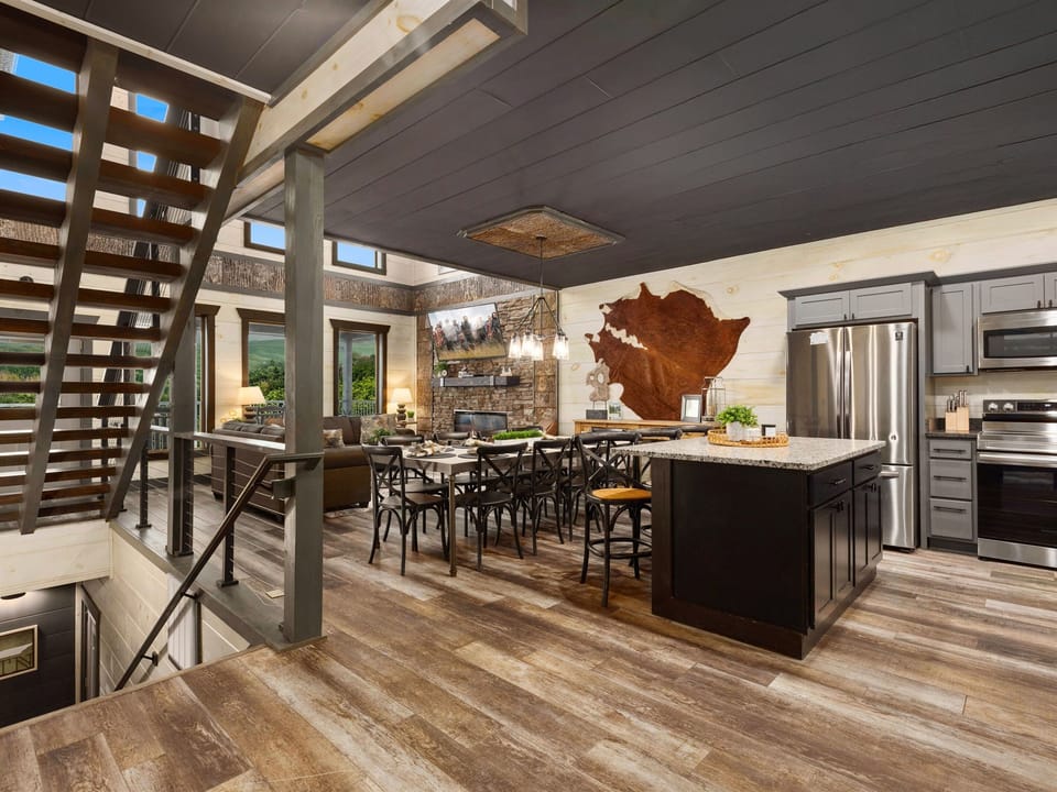 Inviting living room with panoramic mountain views for the whole family.