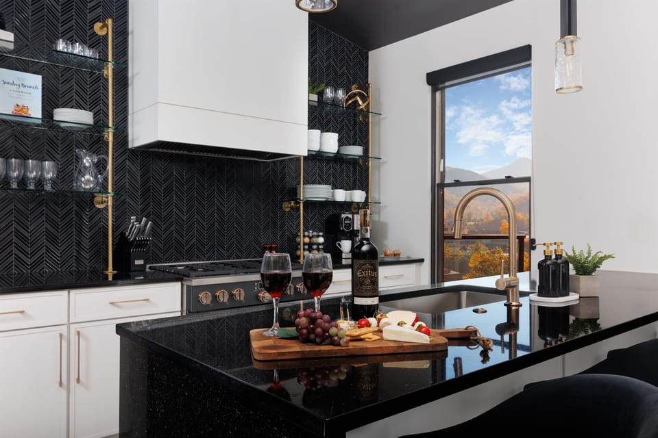 Cook with ease in the fully equipped kitchen, featuring modern appliances, ample counter space, and all the essentials you need for preparing anything from quick snacks to full family meals.