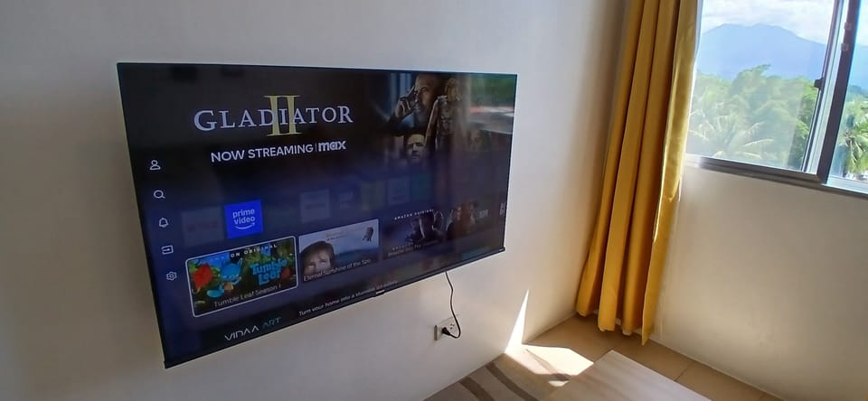 Movie nights made better! Cozy TV room with streaming & Netflix