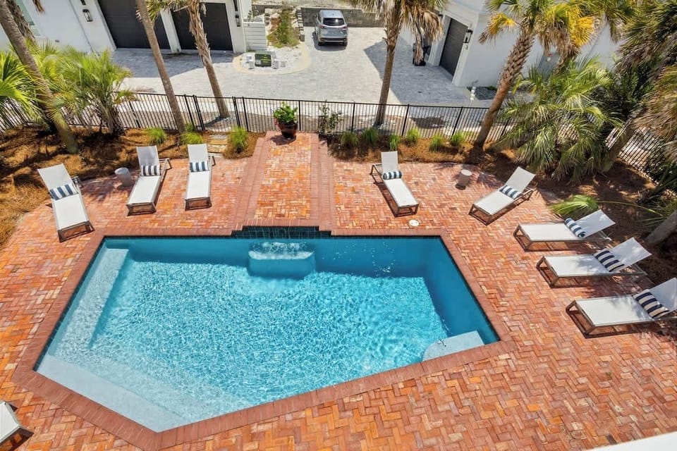 Catch the rays of the emerald coast by the private pool.