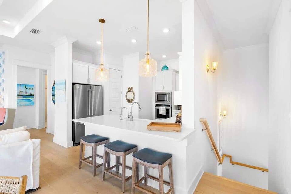 Kitchen island features seating for 3.