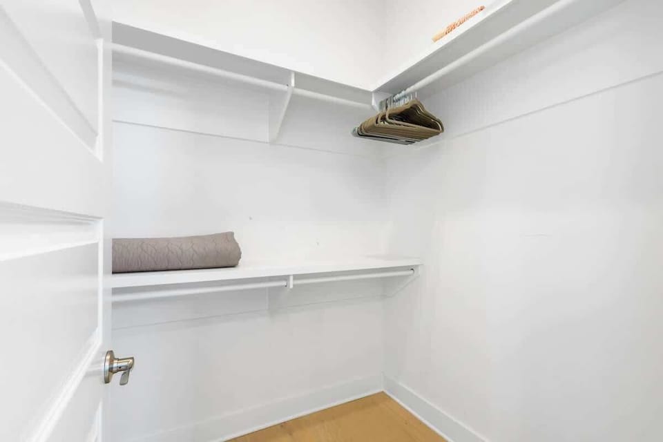 Bathroom includes a large walk-in closet.
