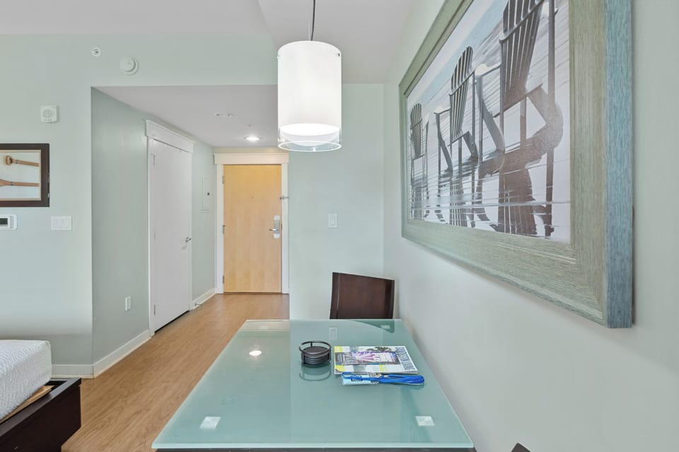 Compact table with two chairs, ideal for casual dining.