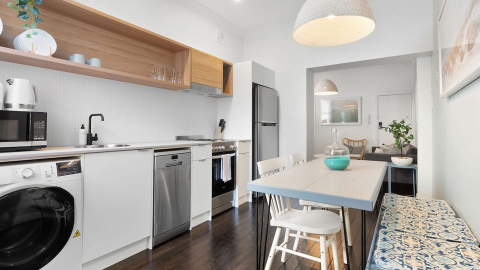 This charming kitchen area is designed for relaxation and connection, making it the heart of your home away from home.