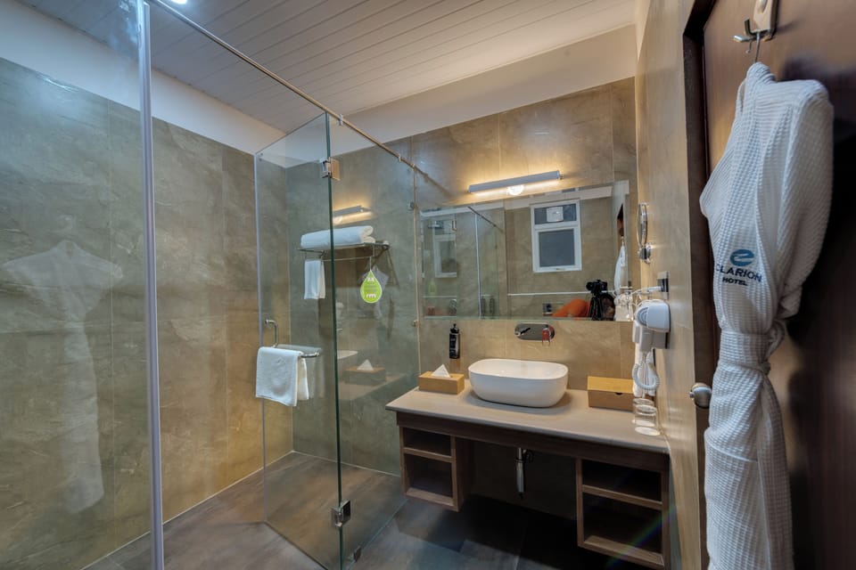 Suite, Hill View | Bathroom | Hair dryer, slippers, towels, soap