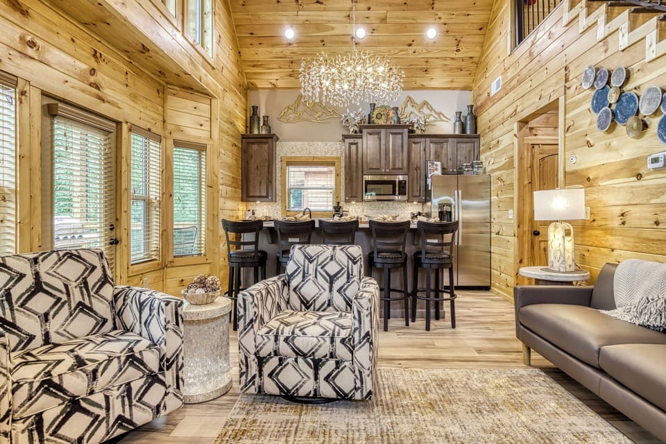 Pigeon Forge Cabin with a Bowling Alley "Midnight Bowling" - Living room and fully furnished kitchen
