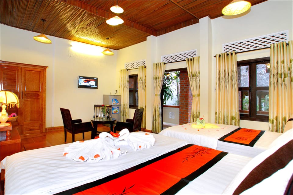 Family Room, Balcony | Minibar, in-room safe, desk, blackout drapes