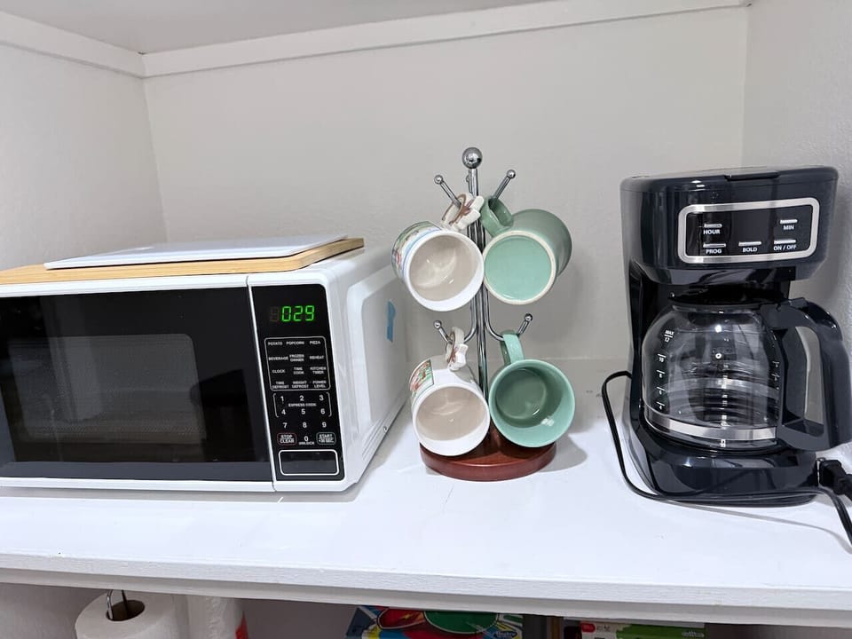 Kitchenette`s microwave and coffee station