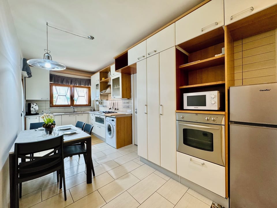 Apartment, 4 Bedrooms, City View | Private kitchen | Espresso maker, electric kettle