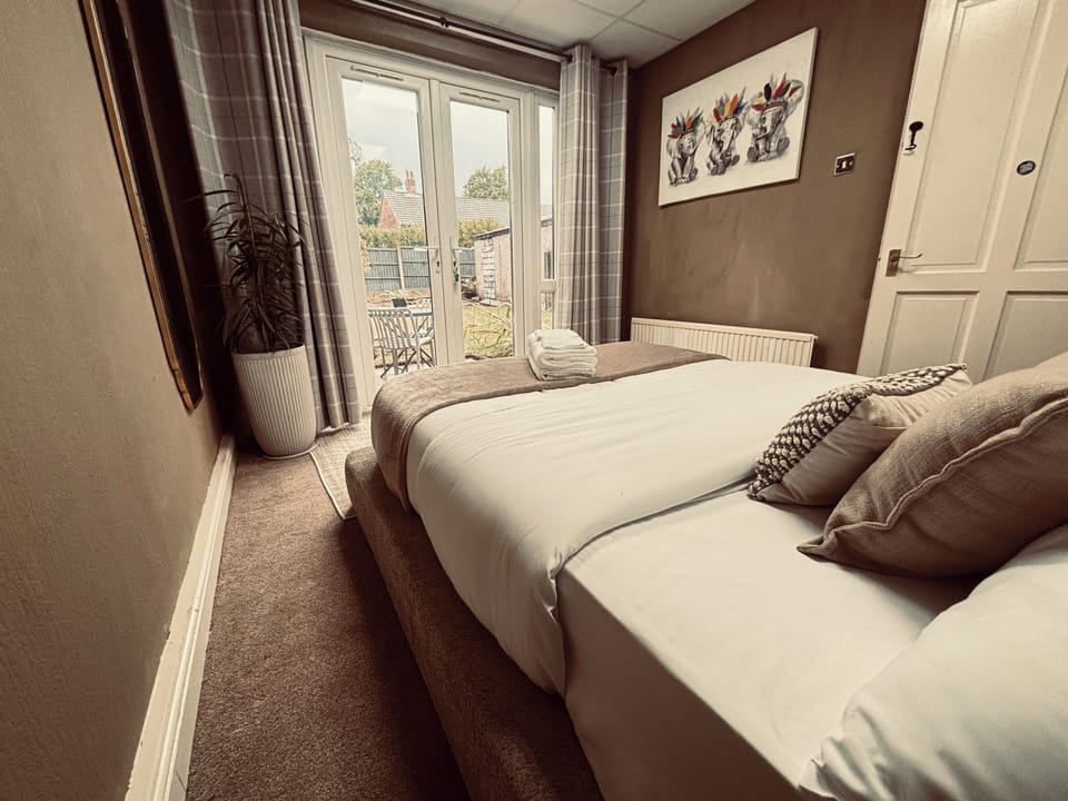 Bedroom two with garden view. 