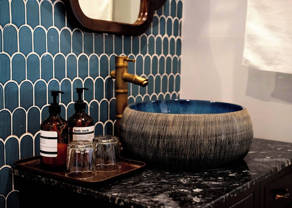 Rainfall showerhead, designer toiletries, hair dryer, bathrobes